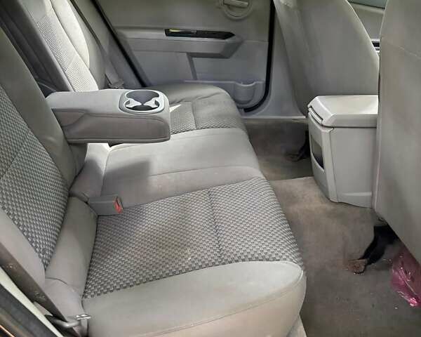 Чорний Додж Avenger, об'ємом двигуна 2 л та пробігом 361 тис. км за 2100 $, фото 3 на Automoto.ua