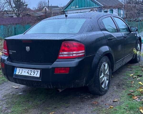 Чорний Додж Avenger, об'ємом двигуна 2 л та пробігом 361 тис. км за 2100 $, фото 1 на Automoto.ua