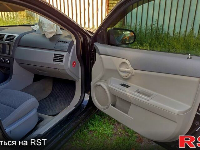 Черный Додж Авенджер, объемом двигателя 2 л и пробегом 152 тыс. км за 2750 $, фото 4 на Automoto.ua