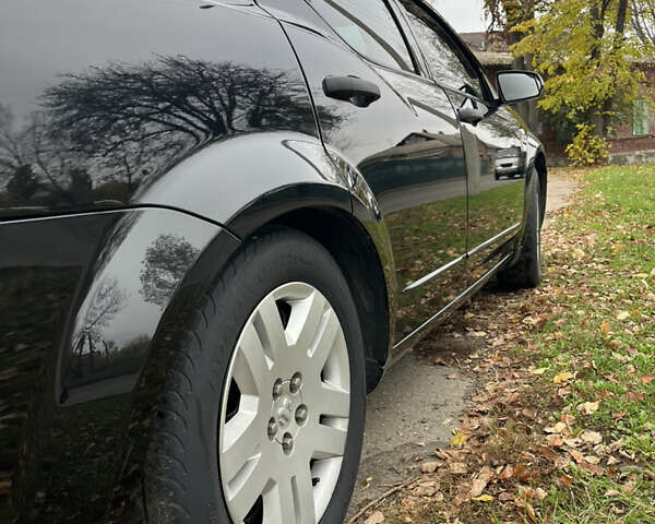 Чорний Додж Avenger, об'ємом двигуна 2 л та пробігом 155 тис. км за 6500 $, фото 6 на Automoto.ua