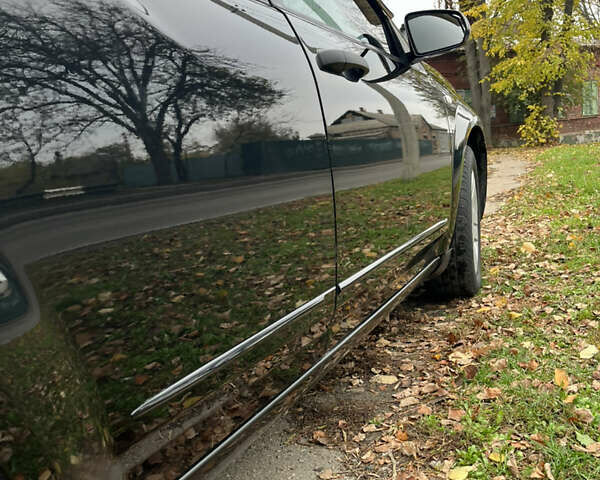 Чорний Додж Avenger, об'ємом двигуна 2 л та пробігом 155 тис. км за 6500 $, фото 5 на Automoto.ua