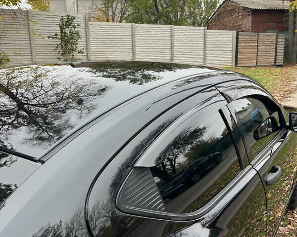 Чорний Додж Avenger, об'ємом двигуна 2 л та пробігом 155 тис. км за 6500 $, фото 4 на Automoto.ua