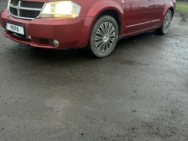 Красный Додж Авенджер, объемом двигателя 2.4 л и пробегом 262 тыс. км за 6000 $, фото 1 на Automoto.ua