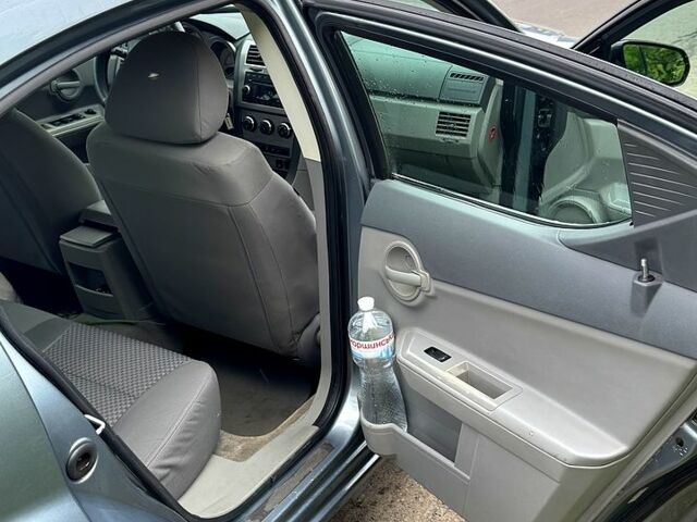 Серый Додж Авенджер, объемом двигателя 2 л и пробегом 580 тыс. км за 4700 $, фото 4 на Automoto.ua