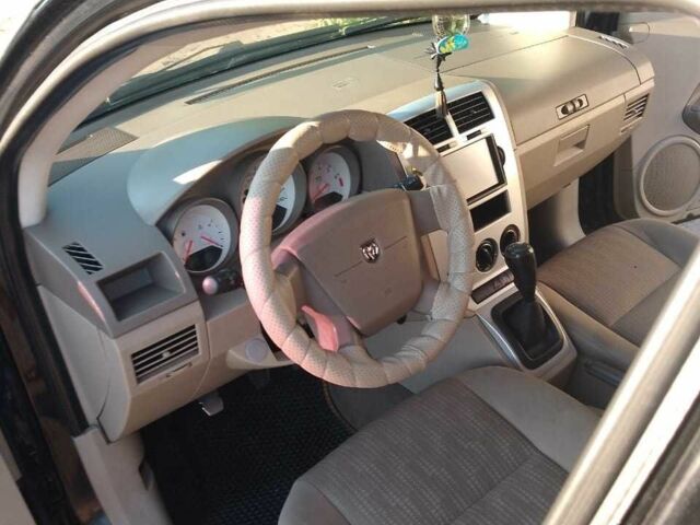 Черный Додж Калибер, объемом двигателя 1.8 л и пробегом 275 тыс. км за 4600 $, фото 1 на Automoto.ua