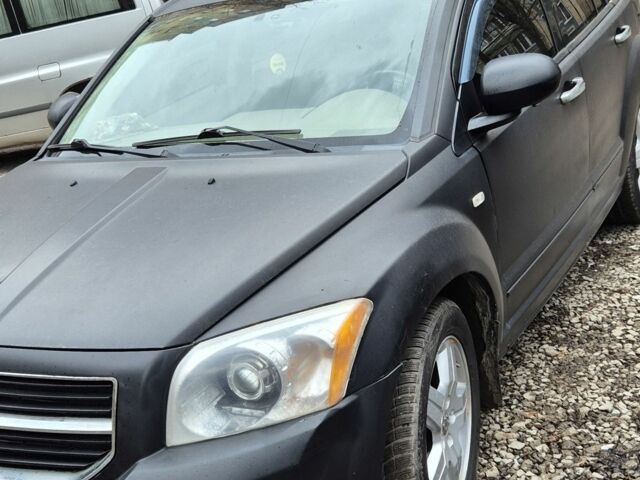 Чорний Додж Caliber, об'ємом двигуна 2 л та пробігом 268 тис. км за 5721 $, фото 1 на Automoto.ua