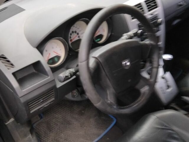 Чорний Додж Caliber, об'ємом двигуна 2 л та пробігом 261 тис. км за 5500 $, фото 8 на Automoto.ua