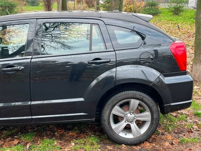 Чорний Додж Caliber, об'ємом двигуна 2 л та пробігом 317 тис. км за 6240 $, фото 6 на Automoto.ua