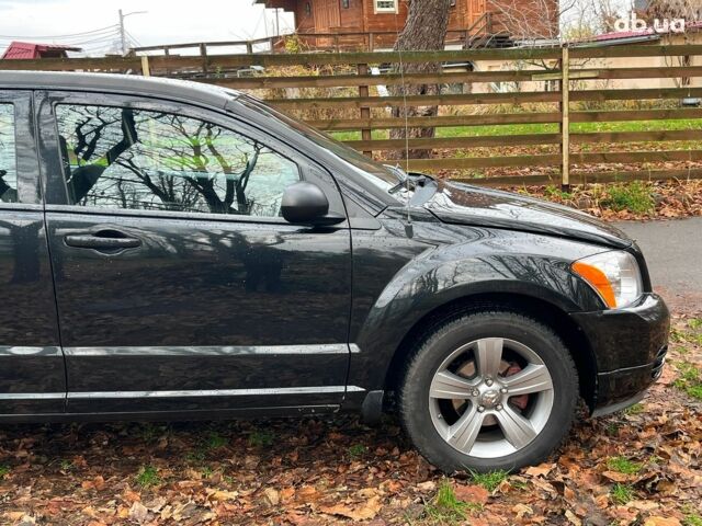 Чорний Додж Caliber, об'ємом двигуна 2 л та пробігом 317 тис. км за 6240 $, фото 13 на Automoto.ua