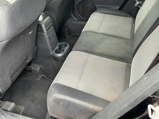 Чорний Додж Caliber, об'ємом двигуна 2 л та пробігом 317 тис. км за 6240 $, фото 21 на Automoto.ua