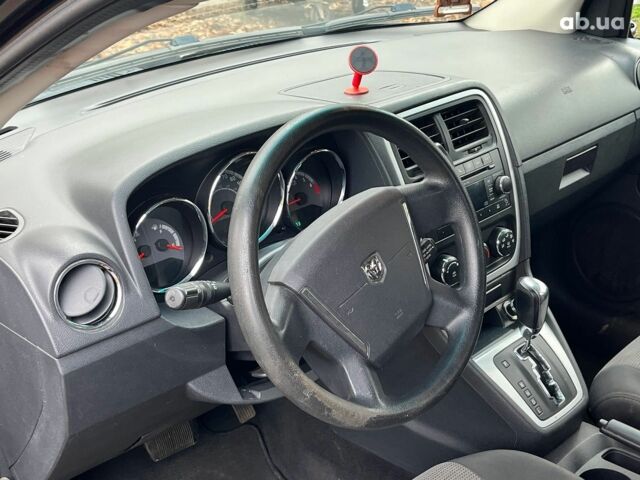 Чорний Додж Caliber, об'ємом двигуна 2 л та пробігом 317 тис. км за 6240 $, фото 25 на Automoto.ua