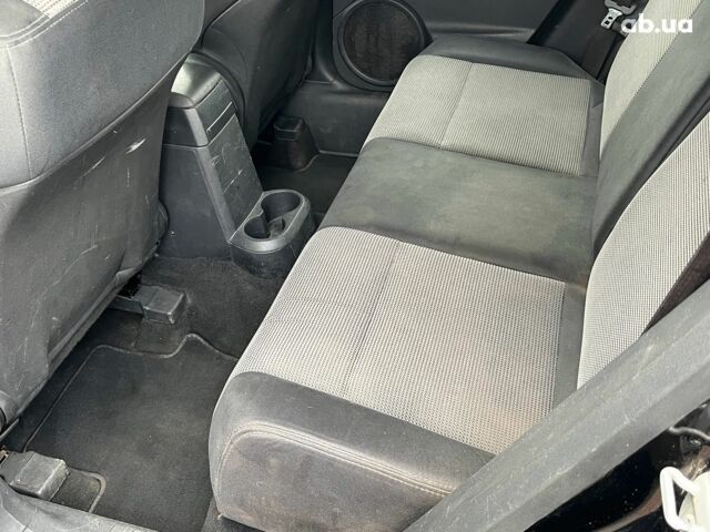 Чорний Додж Caliber, об'ємом двигуна 2 л та пробігом 317 тис. км за 6240 $, фото 21 на Automoto.ua