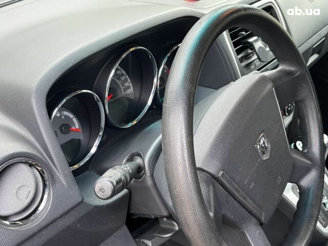 Чорний Додж Caliber, об'ємом двигуна 2 л та пробігом 317 тис. км за 6240 $, фото 26 на Automoto.ua