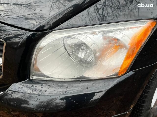 Чорний Додж Caliber, об'ємом двигуна 2 л та пробігом 317 тис. км за 6240 $, фото 4 на Automoto.ua