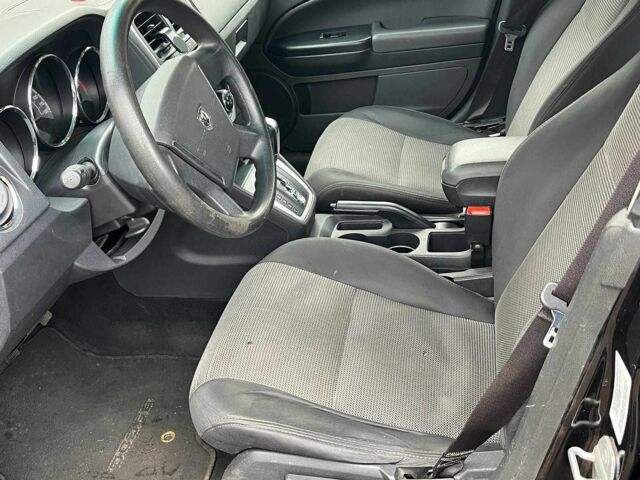 Чорний Додж Caliber, об'ємом двигуна 2 л та пробігом 317 тис. км за 6240 $, фото 23 на Automoto.ua