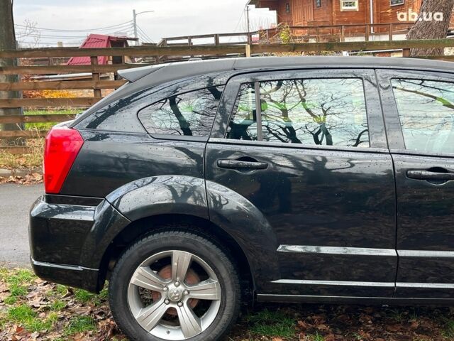 Чорний Додж Caliber, об'ємом двигуна 2 л та пробігом 317 тис. км за 6240 $, фото 12 на Automoto.ua