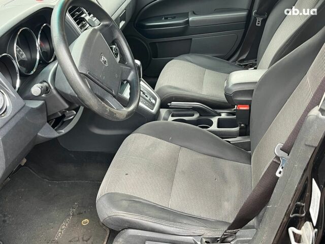 Чорний Додж Caliber, об'ємом двигуна 2 л та пробігом 317 тис. км за 6240 $, фото 23 на Automoto.ua