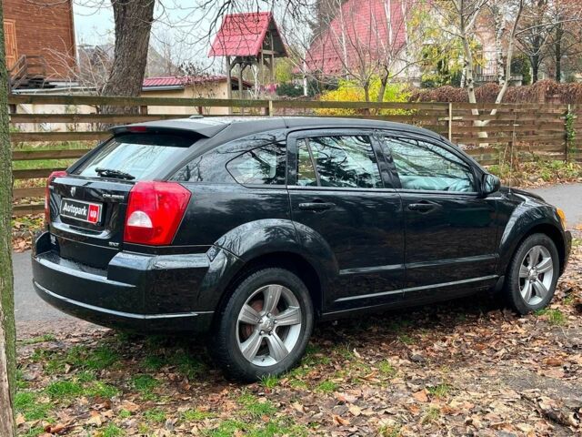 Чорний Додж Caliber, об'ємом двигуна 2 л та пробігом 317 тис. км за 6240 $, фото 11 на Automoto.ua