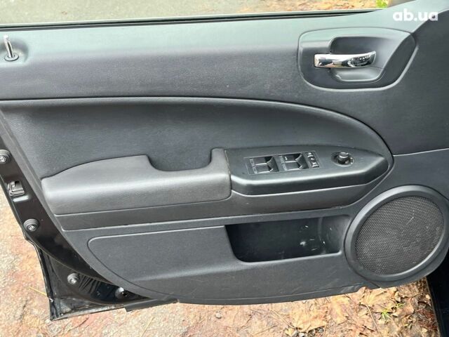 Чорний Додж Caliber, об'ємом двигуна 2 л та пробігом 317 тис. км за 6240 $, фото 24 на Automoto.ua