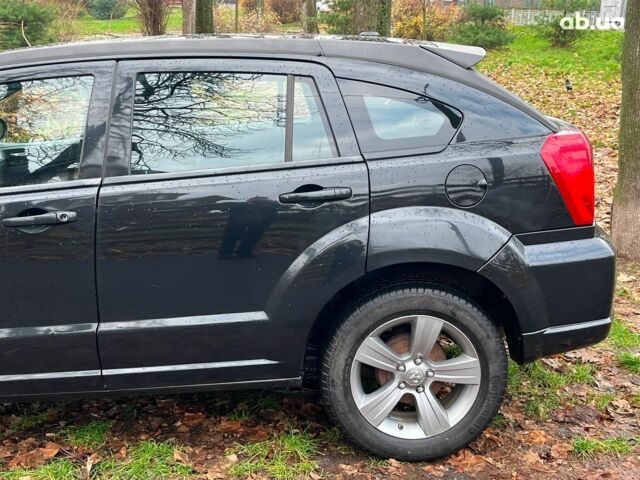 Чорний Додж Caliber, об'ємом двигуна 2 л та пробігом 317 тис. км за 6240 $, фото 6 на Automoto.ua