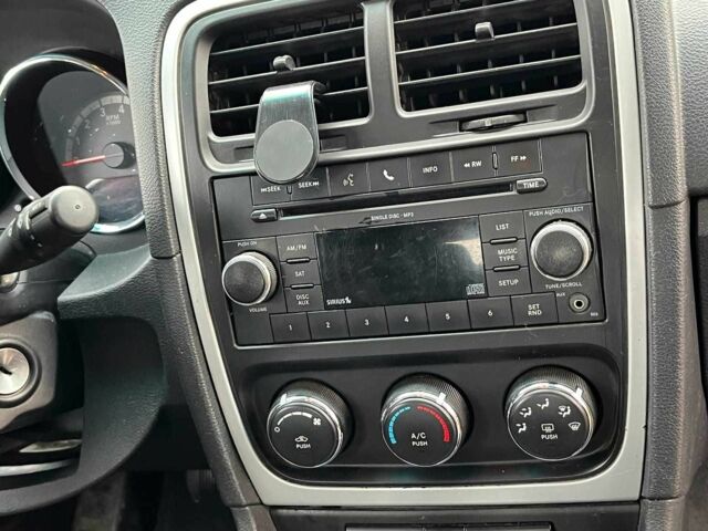 Чорний Додж Caliber, об'ємом двигуна 2 л та пробігом 317 тис. км за 6240 $, фото 17 на Automoto.ua