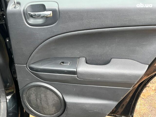 Чорний Додж Caliber, об'ємом двигуна 2 л та пробігом 317 тис. км за 6240 $, фото 19 на Automoto.ua