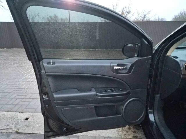 Чорний Додж Caliber, об'ємом двигуна 2.4 л та пробігом 177 тис. км за 7899 $, фото 1 на Automoto.ua