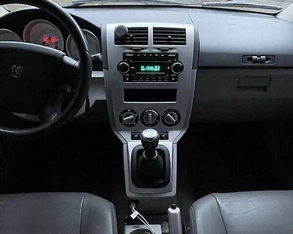 Черный Додж Калибер, объемом двигателя 1.97 л и пробегом 210 тыс. км за 5350 $, фото 13 на Automoto.ua