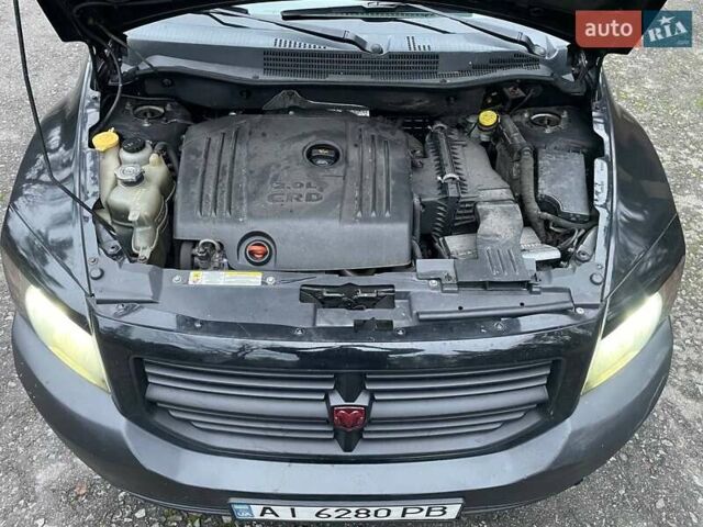 Черный Додж Калибер, объемом двигателя 1.97 л и пробегом 210 тыс. км за 5350 $, фото 23 на Automoto.ua