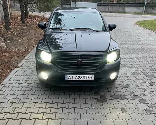 Черный Додж Калибер, объемом двигателя 1.97 л и пробегом 210 тыс. км за 5350 $, фото 27 на Automoto.ua