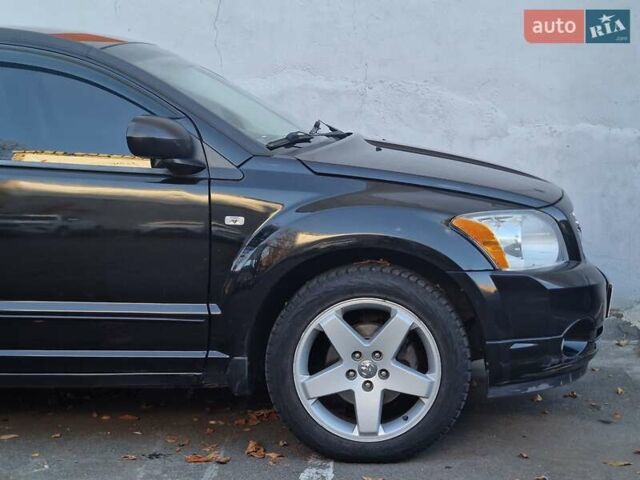 Черный Додж Калибер, объемом двигателя 2 л и пробегом 224 тыс. км за 5990 $, фото 19 на Automoto.ua
