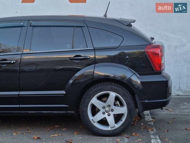Черный Додж Калибер, объемом двигателя 2 л и пробегом 224 тыс. км за 5990 $, фото 22 на Automoto.ua