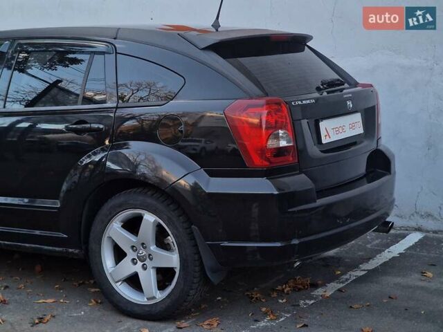 Черный Додж Калибер, объемом двигателя 2 л и пробегом 224 тыс. км за 5990 $, фото 23 на Automoto.ua