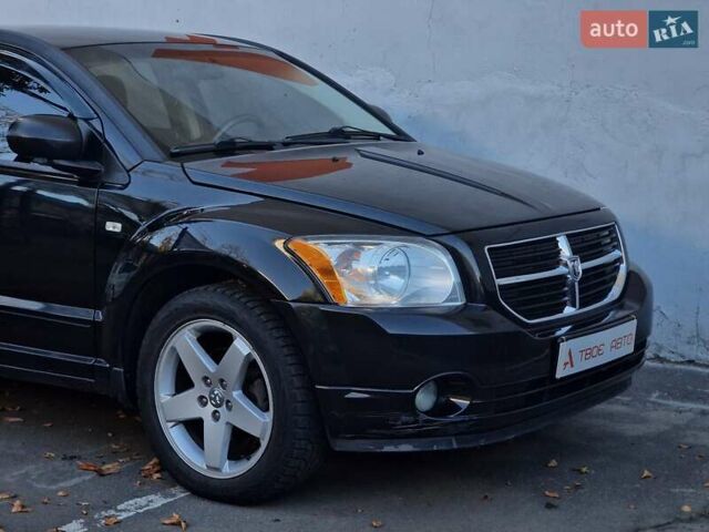 Черный Додж Калибер, объемом двигателя 2 л и пробегом 224 тыс. км за 5990 $, фото 20 на Automoto.ua