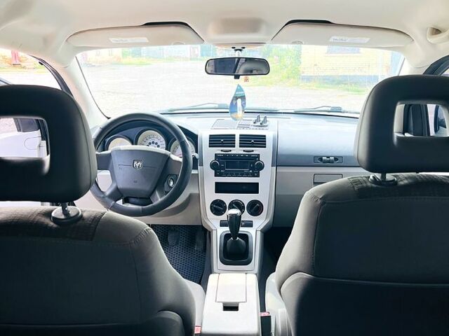 Чорний Додж Caliber, об'ємом двигуна 1.8 л та пробігом 240 тис. км за 5600 $, фото 4 на Automoto.ua