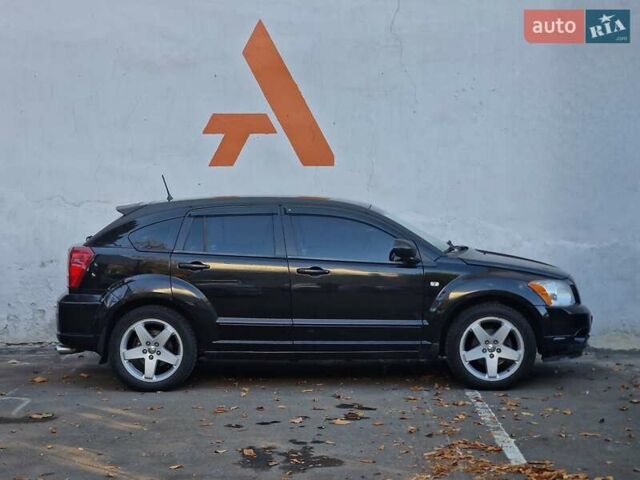 Черный Додж Калибер, объемом двигателя 2 л и пробегом 224 тыс. км за 5990 $, фото 18 на Automoto.ua
