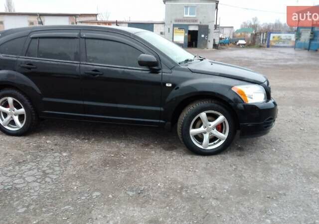 Чорний Додж Caliber, об'ємом двигуна 1.8 л та пробігом 220 тис. км за 5900 $, фото 6 на Automoto.ua