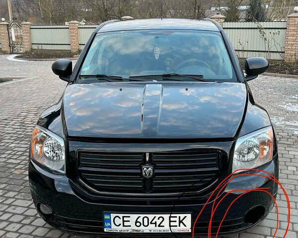 Черный Додж Калибер, объемом двигателя 1.97 л и пробегом 230 тыс. км за 5800 $, фото 5 на Automoto.ua