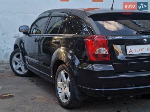 Черный Додж Калибер, объемом двигателя 2 л и пробегом 224 тыс. км за 5990 $, фото 27 на Automoto.ua