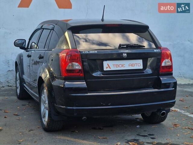 Черный Додж Калибер, объемом двигателя 2 л и пробегом 224 тыс. км за 5990 $, фото 37 на Automoto.ua