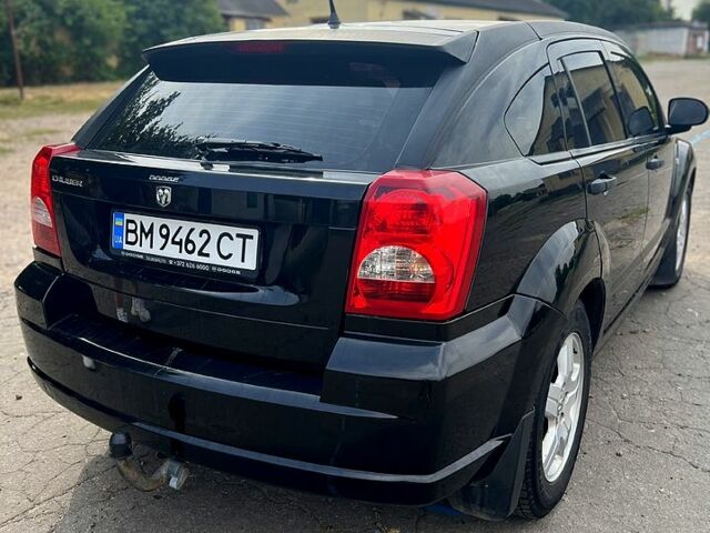Чорний Додж Caliber, об'ємом двигуна 1.8 л та пробігом 240 тис. км за 5600 $, фото 1 на Automoto.ua