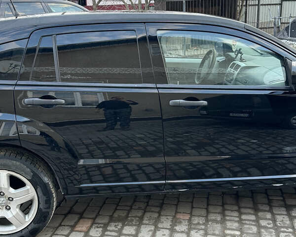 Черный Додж Калибер, объемом двигателя 1.97 л и пробегом 230 тыс. км за 5800 $, фото 4 на Automoto.ua