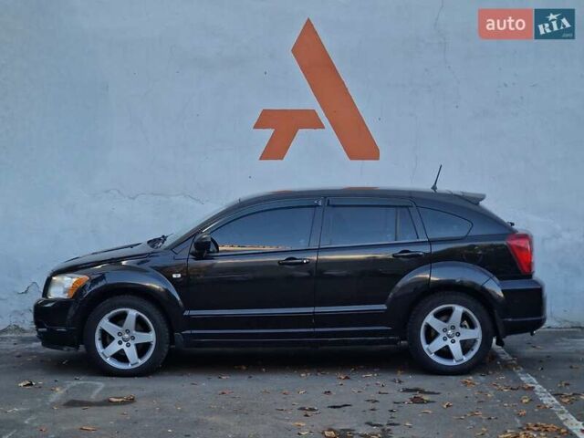 Черный Додж Калибер, объемом двигателя 2 л и пробегом 224 тыс. км за 5990 $, фото 21 на Automoto.ua