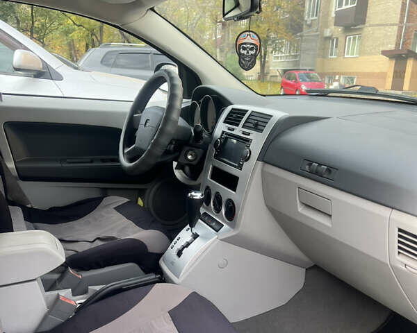 Чорний Додж Caliber, об'ємом двигуна 2 л та пробігом 170 тис. км за 6000 $, фото 6 на Automoto.ua