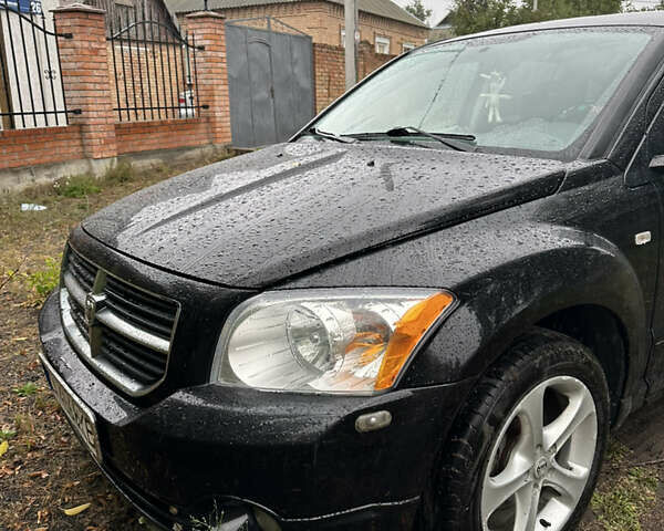 Чорний Додж Caliber, об'ємом двигуна 1.96 л та пробігом 250 тис. км за 4747 $, фото 1 на Automoto.ua