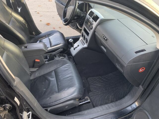 Черный Додж Калибер, объемом двигателя 2 л и пробегом 250 тыс. км за 1900 $, фото 11 на Automoto.ua