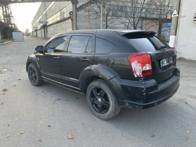 Черный Додж Калибер, объемом двигателя 2 л и пробегом 250 тыс. км за 1900 $, фото 2 на Automoto.ua