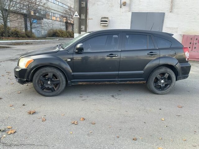 Черный Додж Калибер, объемом двигателя 2 л и пробегом 250 тыс. км за 1900 $, фото 1 на Automoto.ua