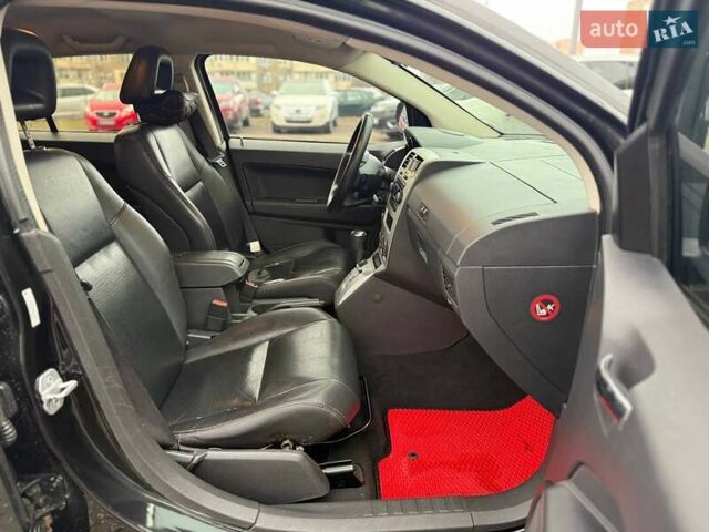 Черный Додж Калибер, объемом двигателя 2 л и пробегом 267 тыс. км за 6490 $, фото 11 на Automoto.ua