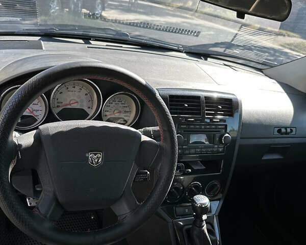 Чорний Додж Caliber, об'ємом двигуна 2.4 л та пробігом 178 тис. км за 8500 $, фото 8 на Automoto.ua